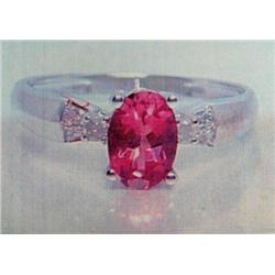 Pink Sapphire and Diamond Lady's Ring 14 K white gold- pink sapphire is oval, faceted approx. 1.00 c