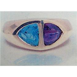 Amethyst and Blue Topaz Lady's Ring 14 K yellow gold- amethyst is trillion, faceted approx. 1.00 car
