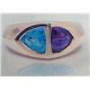 Image 1 : Amethyst and Blue Topaz Lady's Ring 14 K yellow gold- amethyst is trillion, faceted approx. 1.00 car