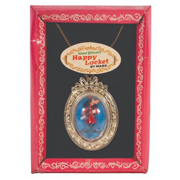 A Rare MARX Goofy Happy Locket on Card.