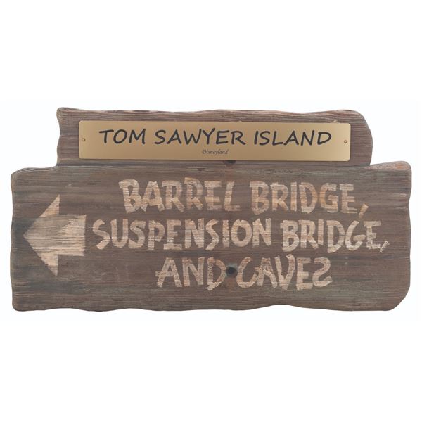 A Tom Sawyer Island Directional Sign.