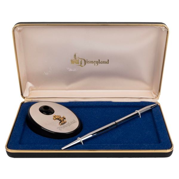 A Disneyland Pen, Stand, and Case.