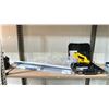 Image 1 : DEWALT VARIABLE SPEED 16MM JIGSAW, DOOR TRIM, AND ROLL OF PARCHMENT PAPER