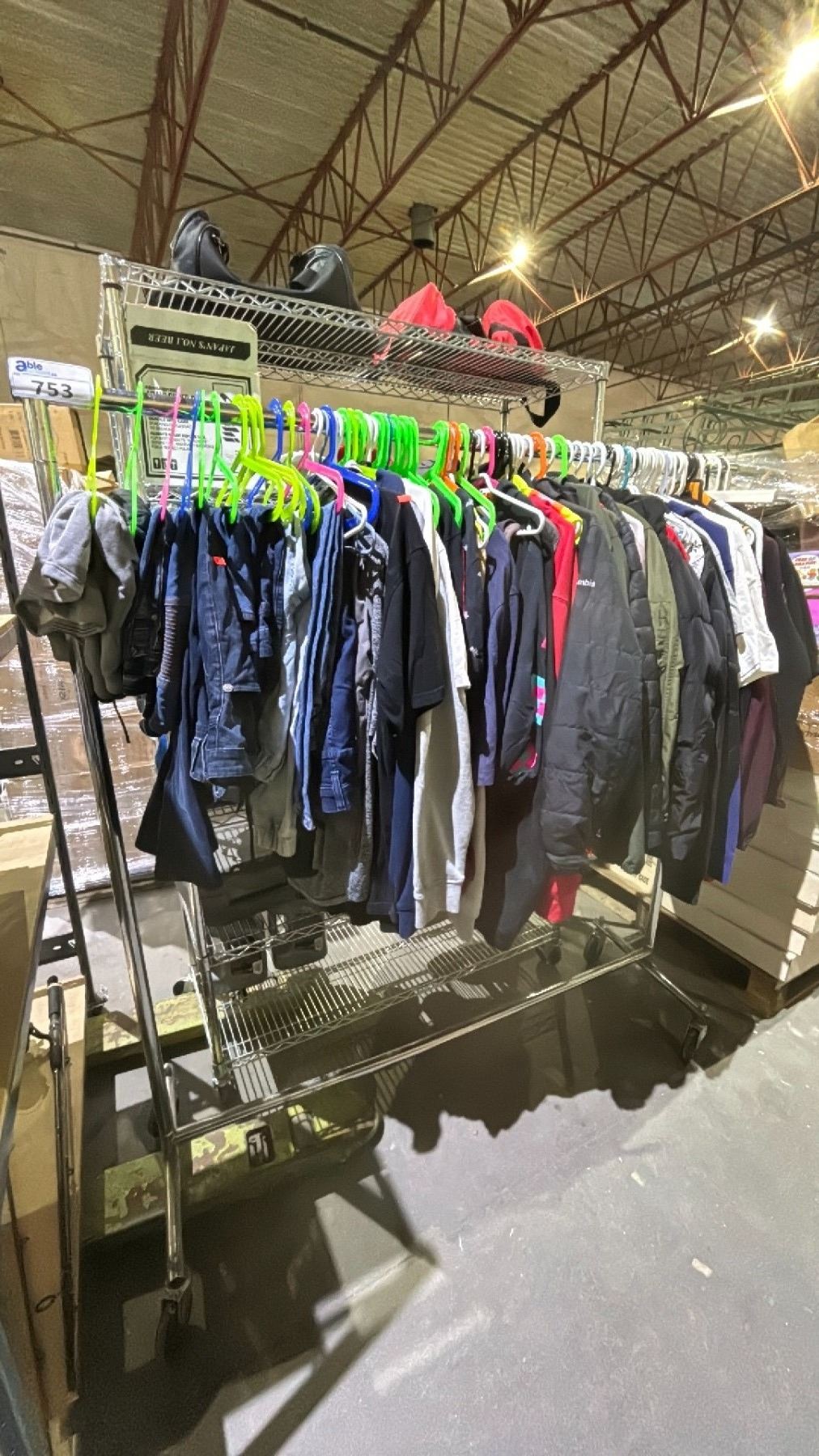 RACK OF ASSORTED CLOTHING *RACK NOT INCLUDED* - Able Auctions