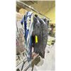 Image 1 : RACK OF LEATHER JACKET, LEATHER PANTS AND DENIM SKIRT