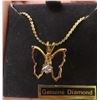 Image 2 : Gold tone neck. W/ genuine diamond butterfly pendent