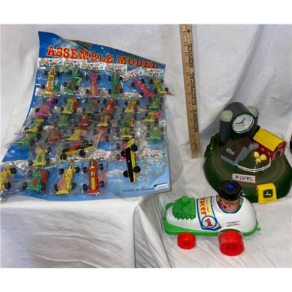 Collection of vintage toys, and John Deer clock