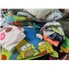 Image 2 : tote of blankets and baby clothes