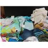 Image 3 : tote of blankets and baby clothes