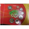 Image 2 : 2009 Holiday Gift Set. 7-coin set includes Colourized Santa 25 Cents. Housed in its original unopene