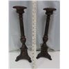 Image 1 : two cast iron candle sticks