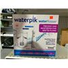 Image 1 : Waterpik Water Flosser Oral Care System