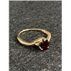 Image 1 : Beautiful 10k Yellow Gold and Garnet Ring. Size 7.75 1.58 gr