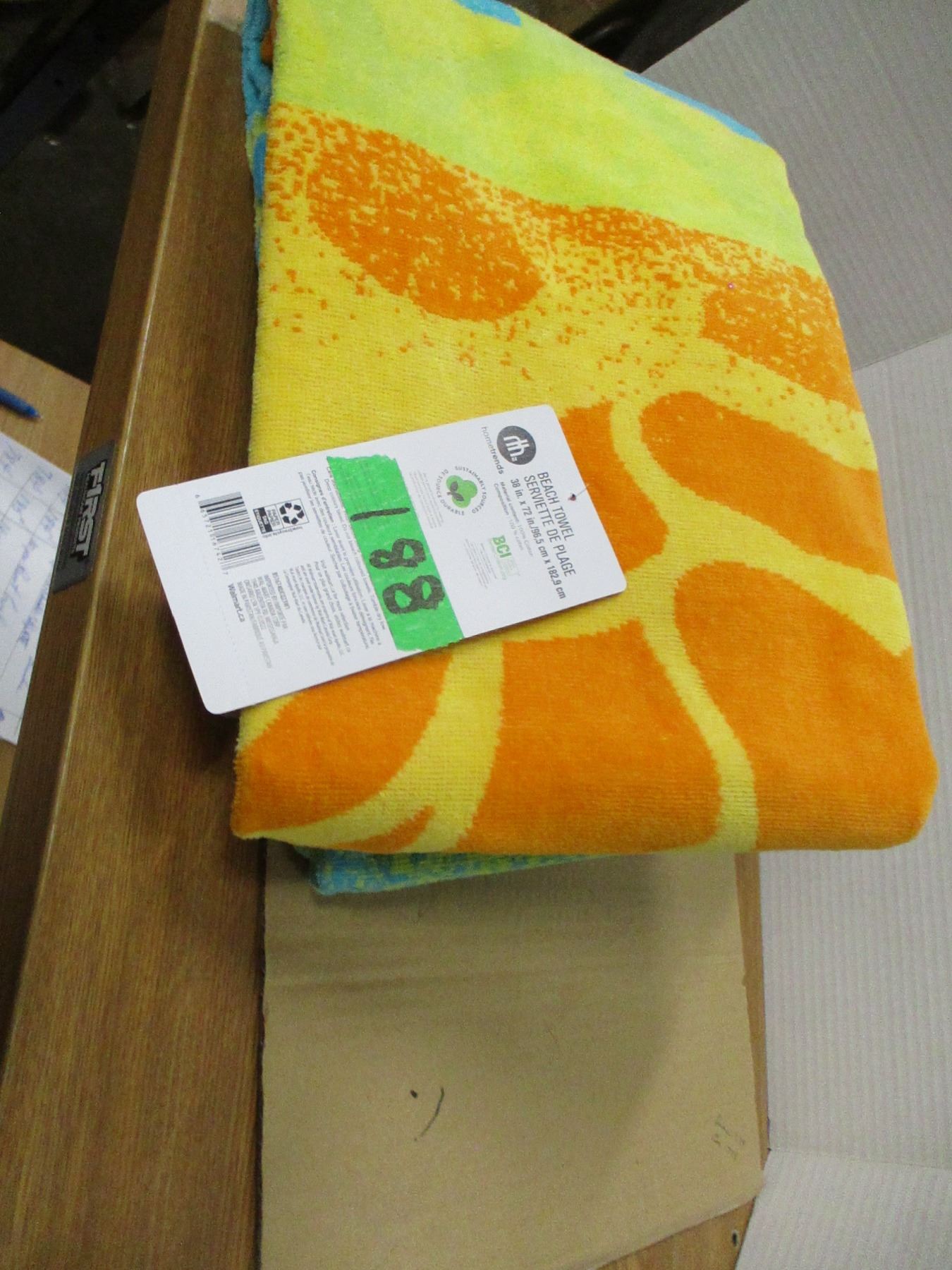 INSURANCE CLAIM (AS IS): YELLOW/ORANGE/BLUE BEACH TOWEL (APPROX. 38