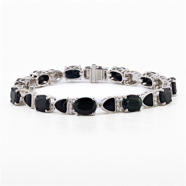 18.52 ctw Blue Sapphire and 0.49 ctw Diamond 18K White Gold Bracelet