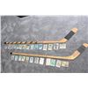 Image 1 : 2 Vintage Hockey Sticks displaying repo NHL rookie cards