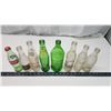 Image 2 : Collection of vintage pop bottles - 7up, Sprite, Coca-Cola, etc.