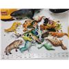 Image 2 : Assorted toys - helmets, animals, dinos, etc.