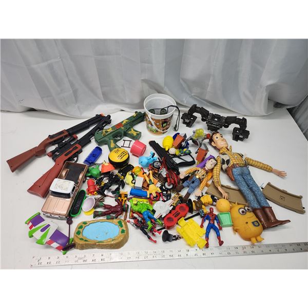 Large collection of toys - figurines, cars, guns, etc.