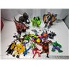 Image 1 : Assorted toys - action figures, dinosaurs, etc.