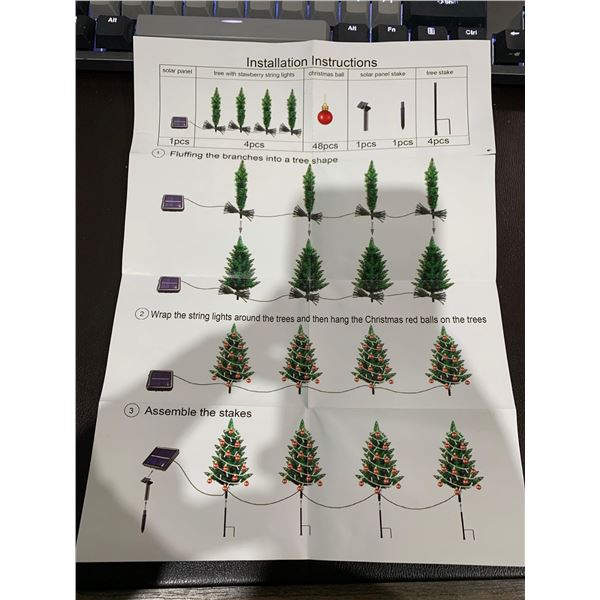 Upgraded 4-pack solar Christmas tree pathway lights outdoor decoration waterproof.