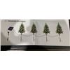 Image 2 : Upgraded 4-pack solar Christmas tree pathway lights outdoor decoration waterproof.