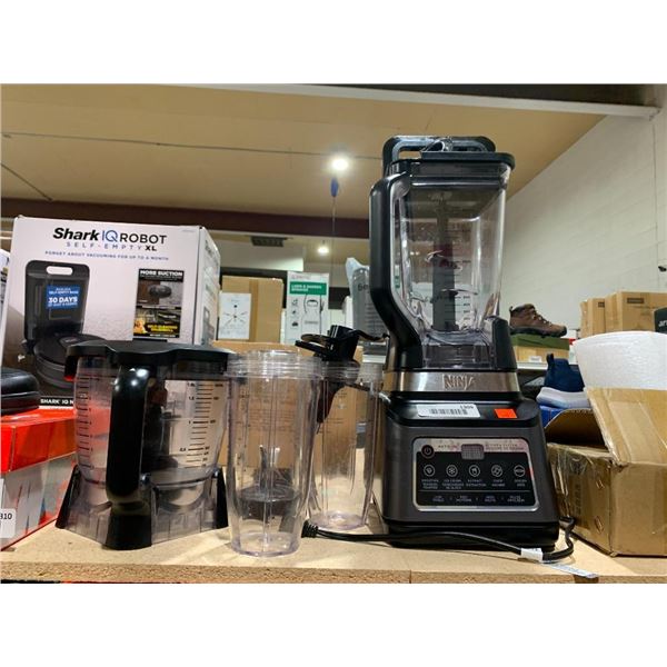 Ninja Juice blender with accessories.