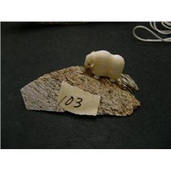 Musk ox on whale bone by Robert Kokuluk