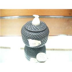 CHOICE on 3 baleen baskets- 403f and 386f made by Carl Hank:  (a) has whales tales, (c) walrus face