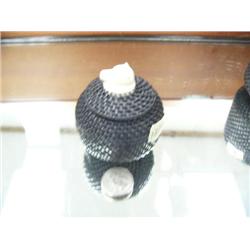 CHOICE on 3 baleen baskets- 403f and 386f made by Carl Hank:  (a) has whales tales, (c) walrus face