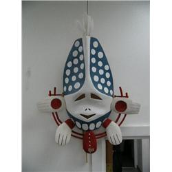 26" wood mask by David Oskakarok- estimated value $2,700