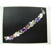 Image 1 : Amethyst and Diamond Bracelet 10 K yellow gold- Amethyst are ova, faceted, approx. 5.00 carats, tran