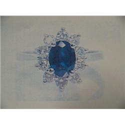 Sapphire and Diamond Lady's Ring 14 K white gold- Sapphire is oval, faceted, approx. 1.00 carats, se