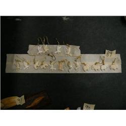 Lot of 8 ivory earrings by Robert Kokuluk: 2 sets of musk ox, 1 set of seals, 1 set of bears, 4 sets