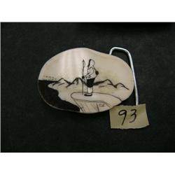 Scrimshawed ivory belt buckle by Carson Sockpick of a hunter