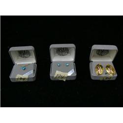 Three pieces of jewelry: Arctic Ice earrings and necklace; jaded earrings