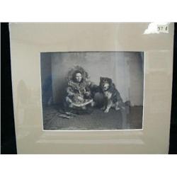 CHOICE on 11 original photographs of Alaska: (d) lady with fancy parka and dog (3)