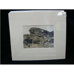 CHOICE on 11 original photographs of Alaska: (f) young lady on rock outcropping ca. 1910 (3)