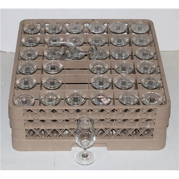 COMMERCIAL DISH RACK FULL OF WINE GLASSES