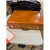 Image 1 : Samsonite suitcase with newspaper clippings