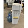 Image 1 : Water machine and 2 water bottles