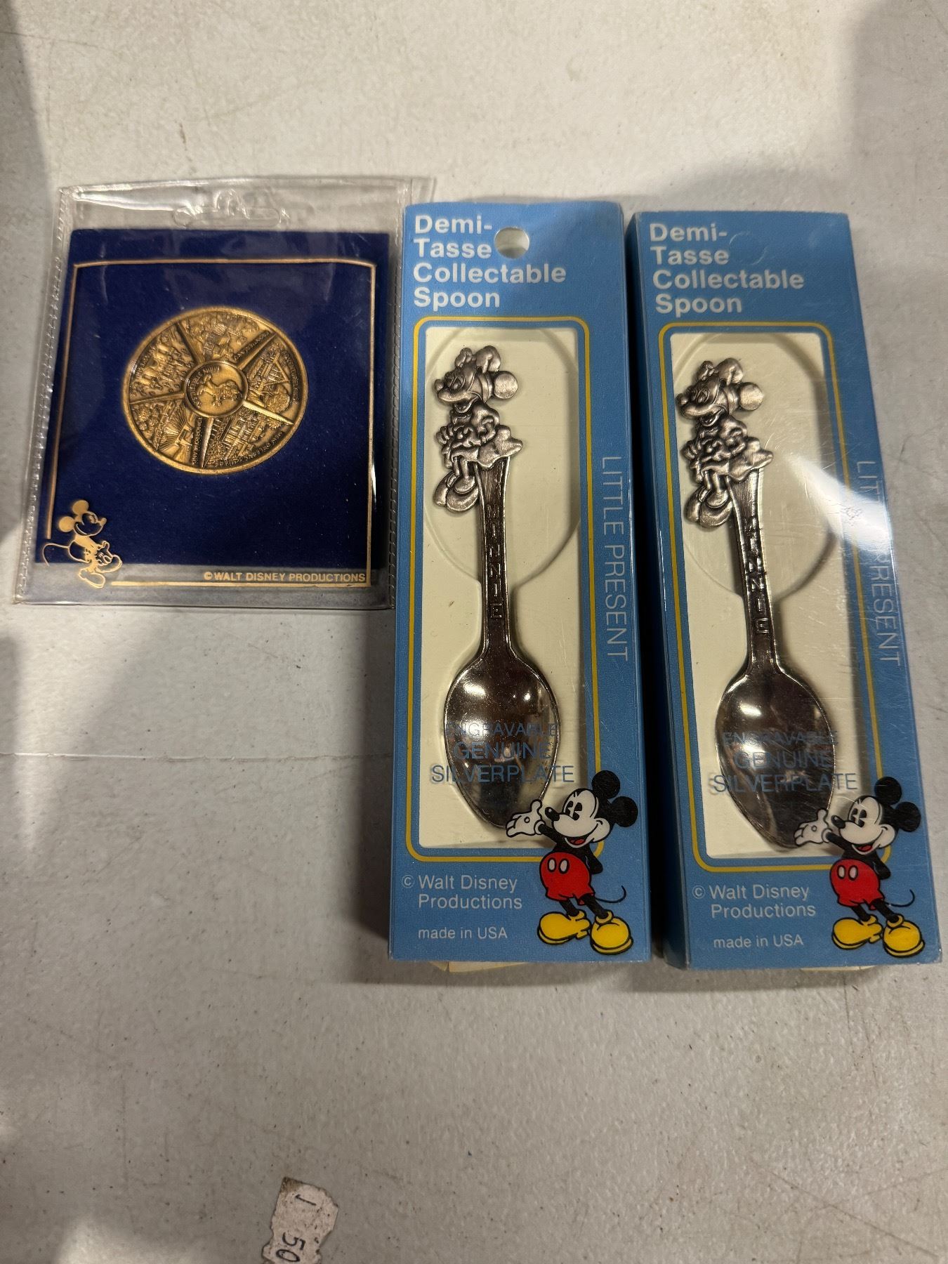 Disney spoons and token