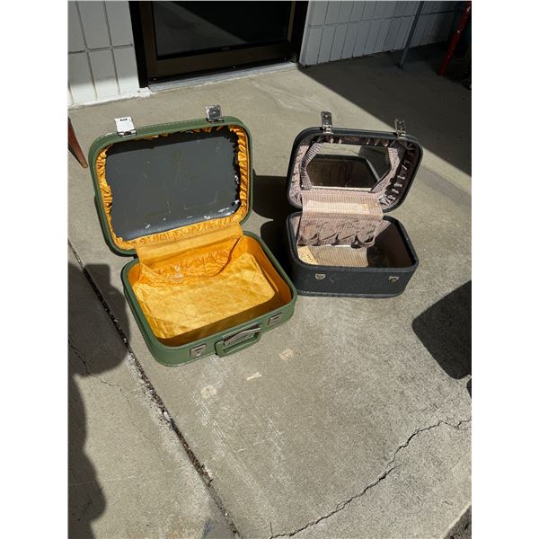 Two carry on vintage suitcases