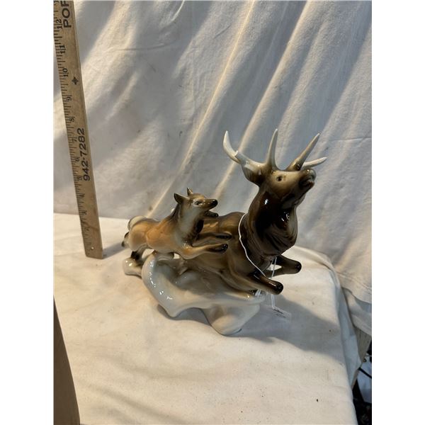 1940's Royal Dux deer and wolf. Chipped antler
