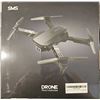 Image 1 : High-tech foldable drone with obstacle avoidance, features 90° shooting angle, new.