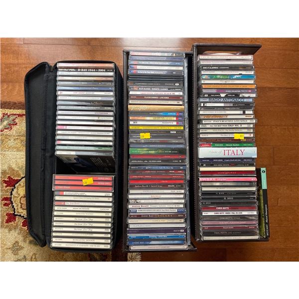 Assorted Collection Of CDs In Decorative Holders