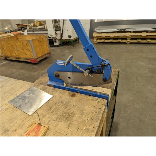 MAGNUM 12" MANUAL SHEAR ON ROLLING CART ATTACHED TO 4X8' WOOD WORK TABLE.