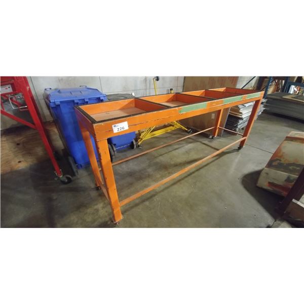 METAL BENCH FRAME ON WHEELS. 8'X2'X39 H