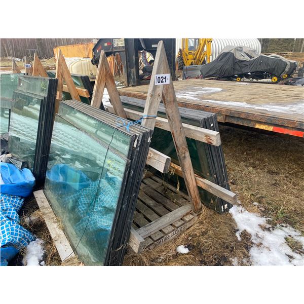 Double paned windows: one (58" x 34"); approx. thirteen (56" x 38" x 1")