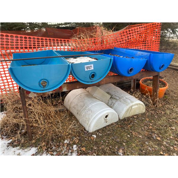 4- Blue 1/2 barrels c/w steel stand & 2- white 1/2 barrels